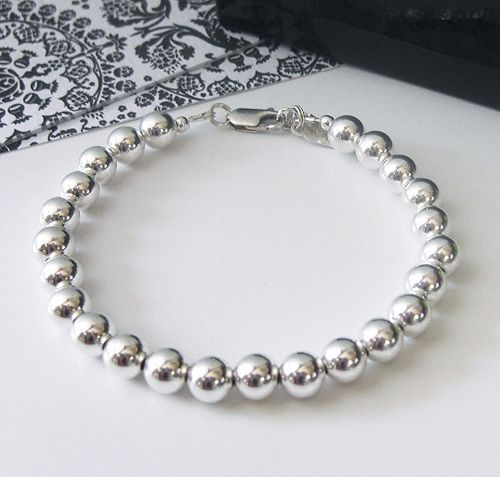 ... is for a Handcrafted Traditional Sterling Silver Beaded Bracelet